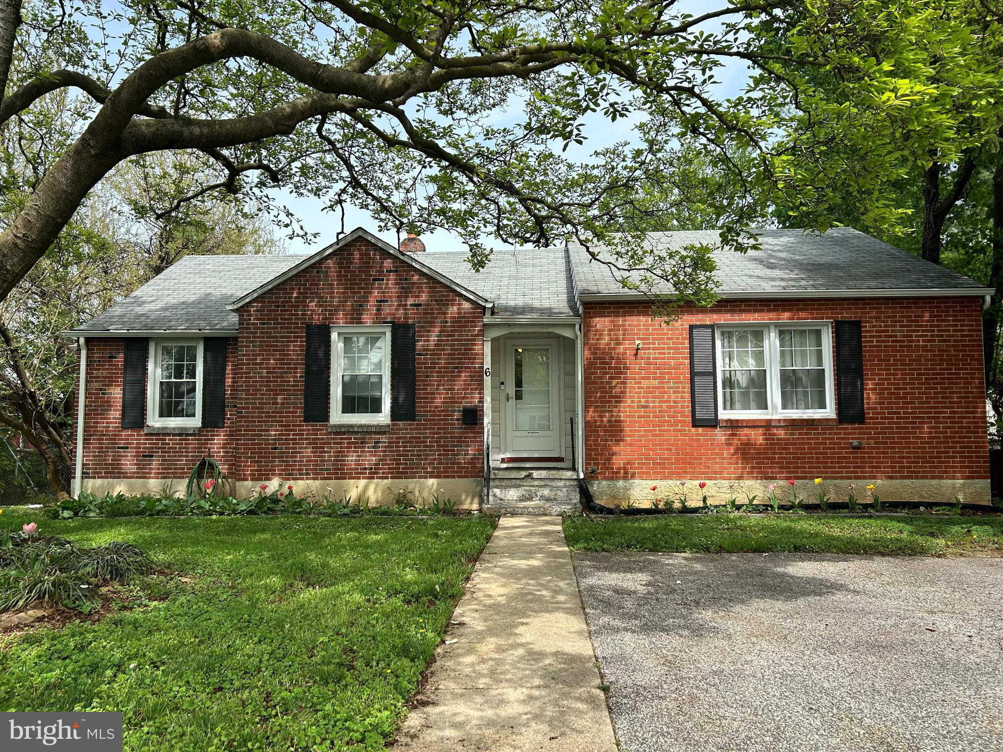 6 Cinder Road Lutherville-Timonium, MD 21093 - Photo 1 of 41 a front view of a house with a garden