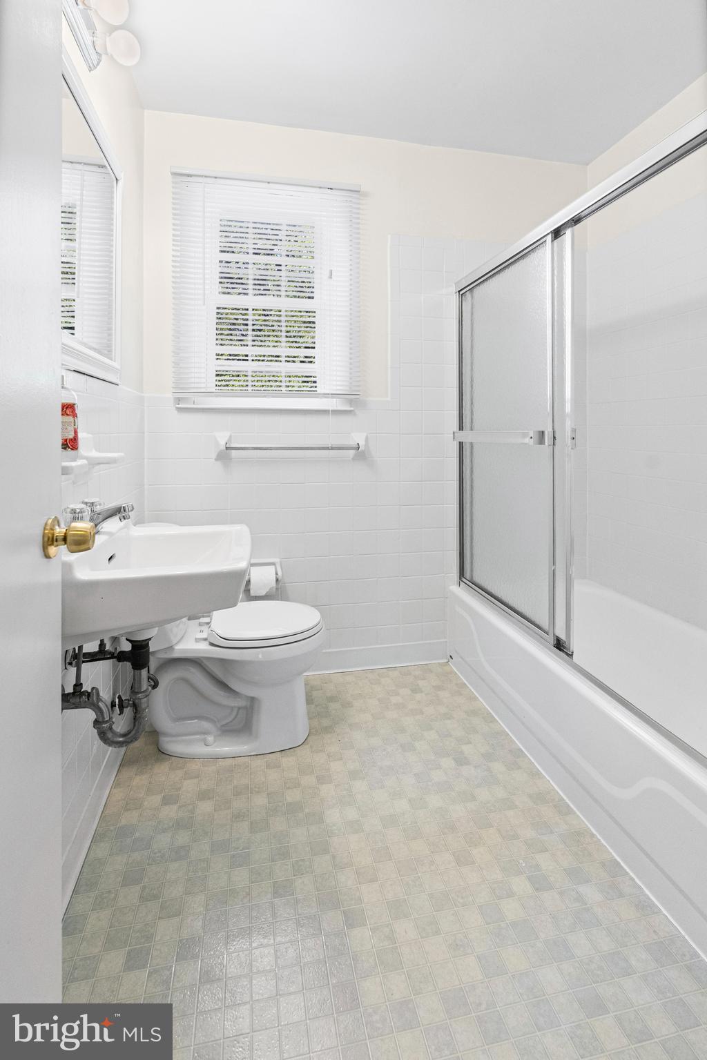 6 Cinder Road Lutherville-Timonium, MD 21093 - Photo 15 of 41 a bathroom with a sink toilet and shower