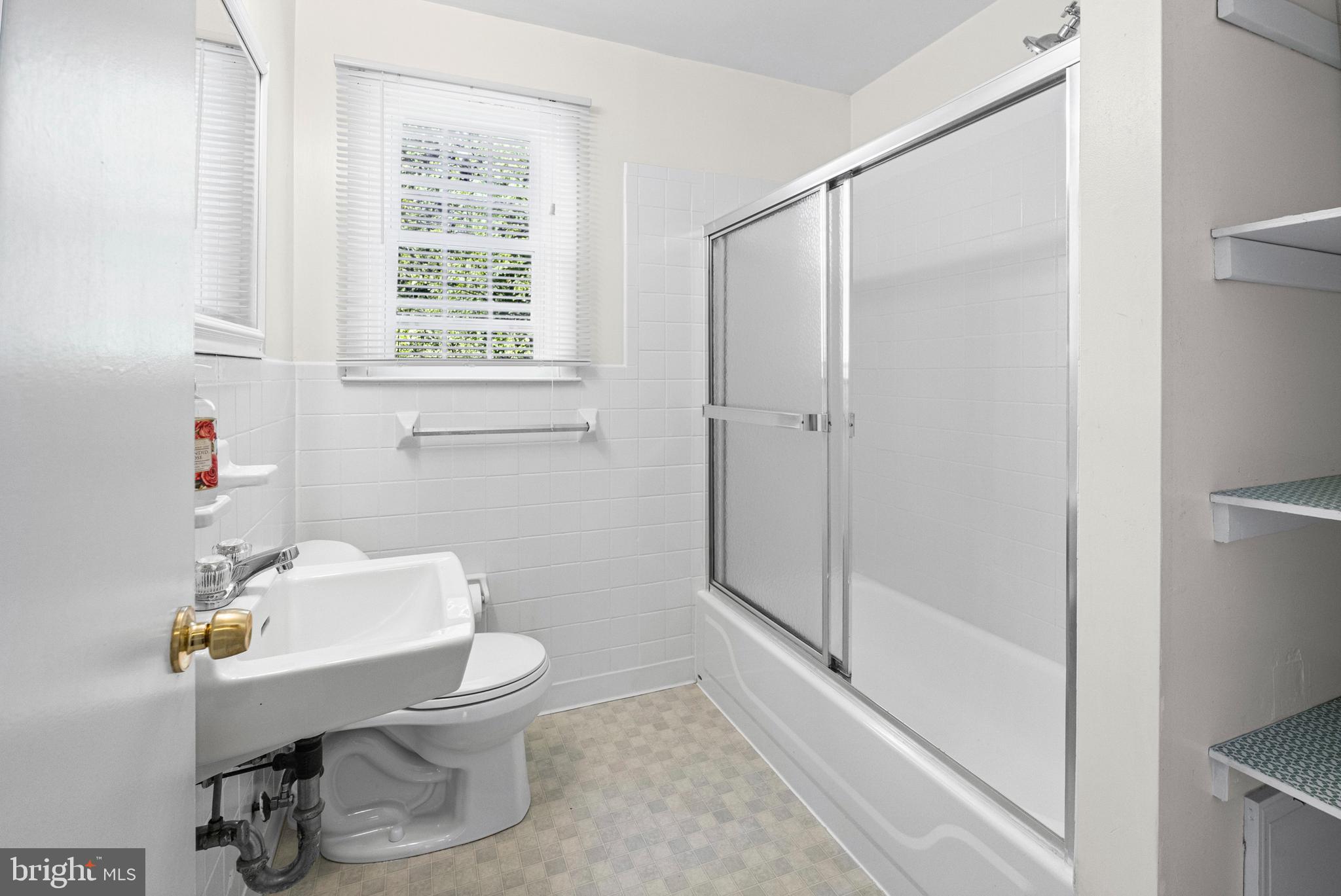 6 Cinder Road Lutherville-Timonium, MD 21093 - Photo 16 of 41 a bathroom with a sink toilet and shower