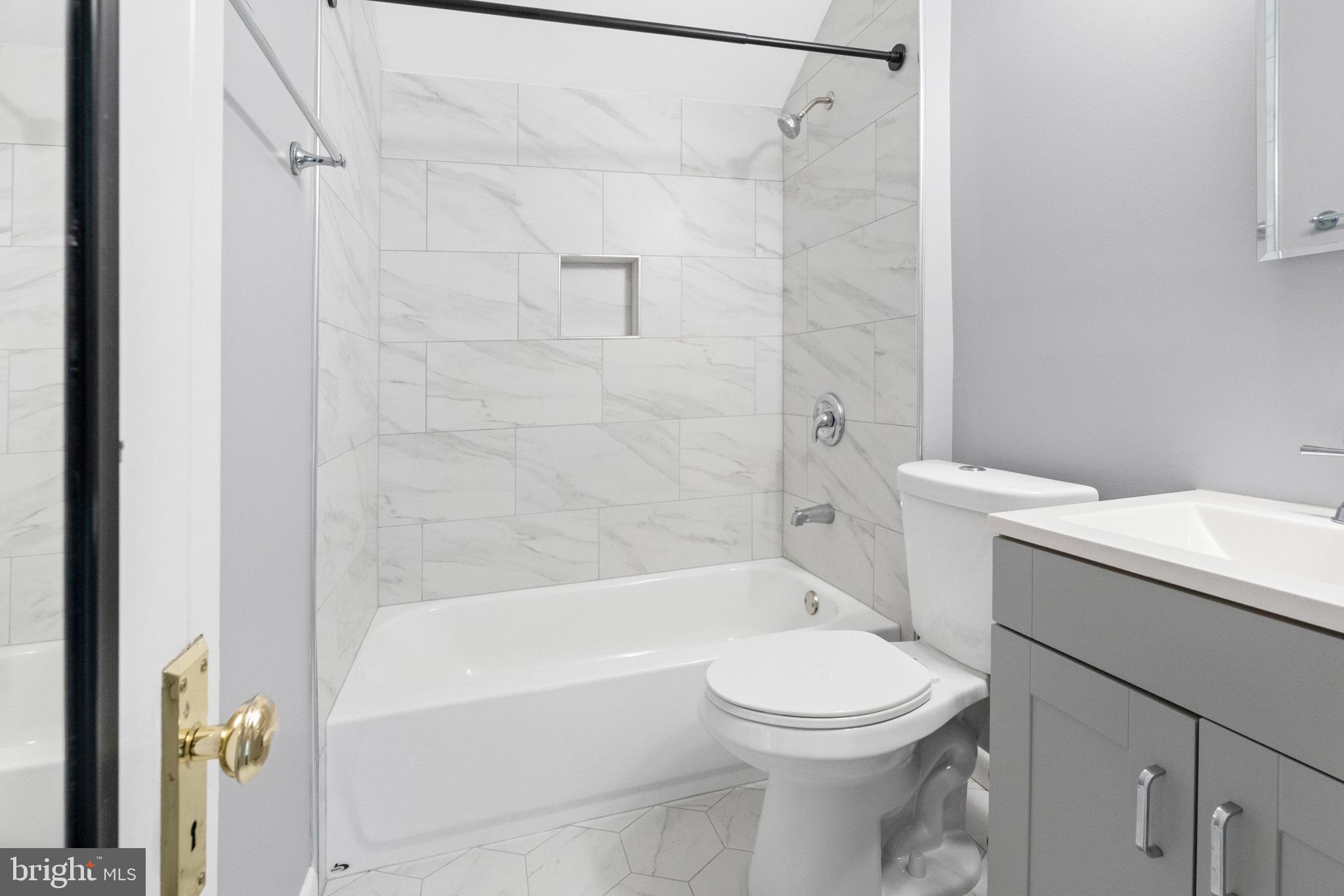 6 Cinder Road Lutherville-Timonium, MD 21093 - Photo 24 of 41 a bathroom with a toilet and a bathtub