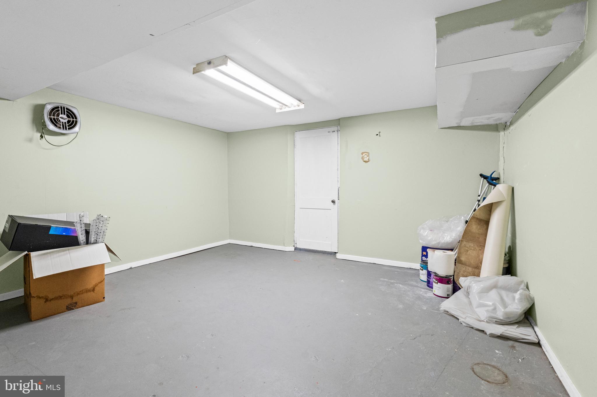 6 Cinder Road Lutherville-Timonium, MD 21093 - Photo 29 of 41 a view of an empty room with wooden floor