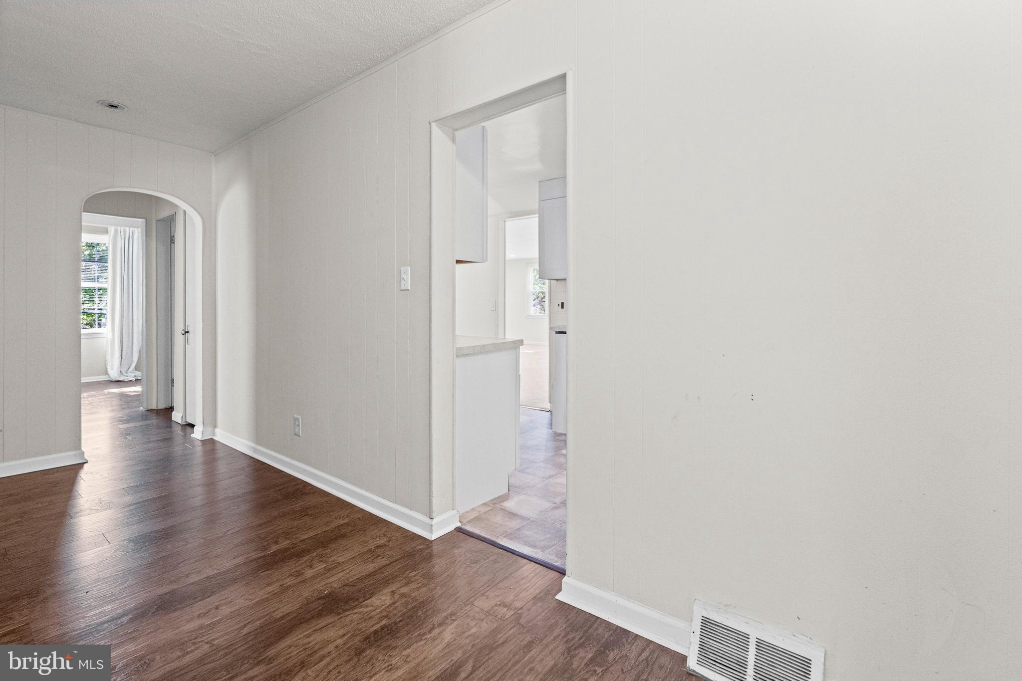 6 Cinder Road Lutherville-Timonium, MD 21093 - Photo 8 of 41 a view of a hallway with wooden floor
