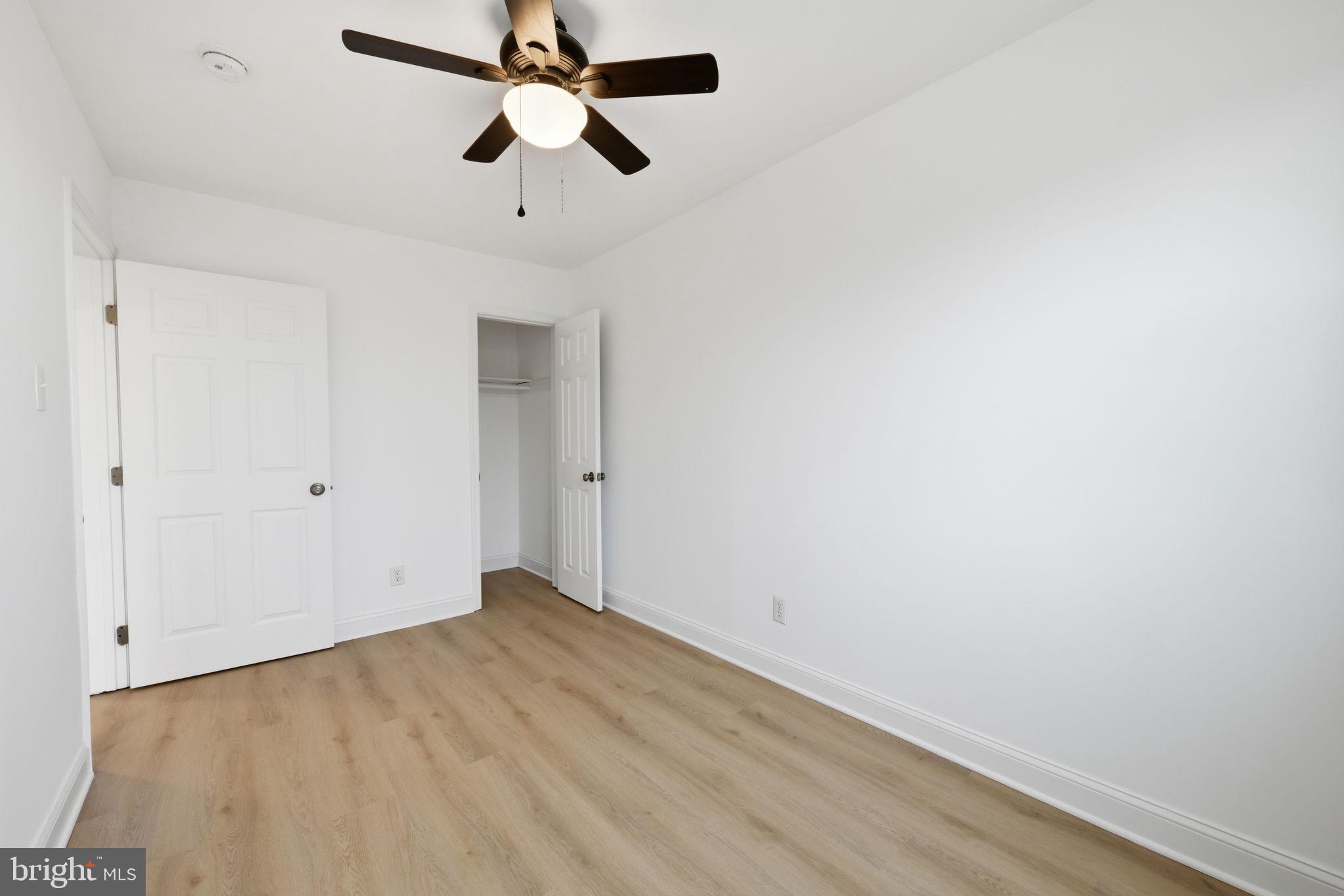 2242 16th Street Northeast Washington, DC 20018 - Photo 28 of 41 an empty room with ceiling fan and window