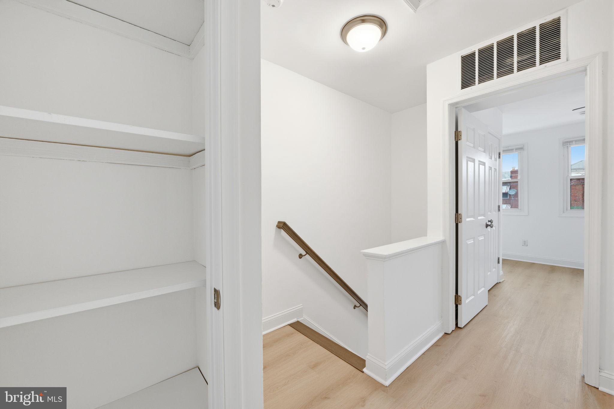 2242 16th Street Northeast Washington, DC 20018 - Photo 29 of 41 a view of a hallway with staircase