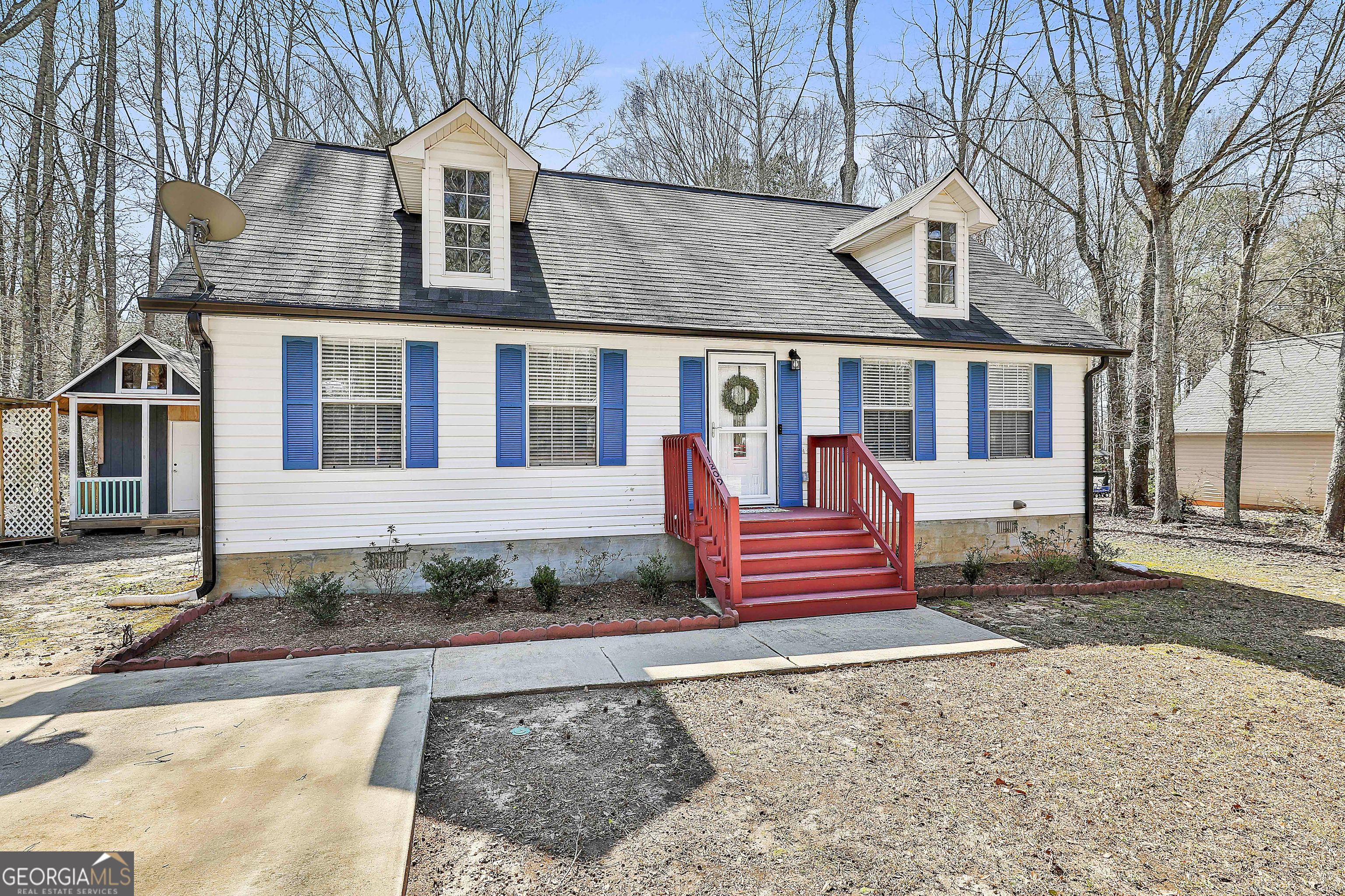front view of a house with a yard