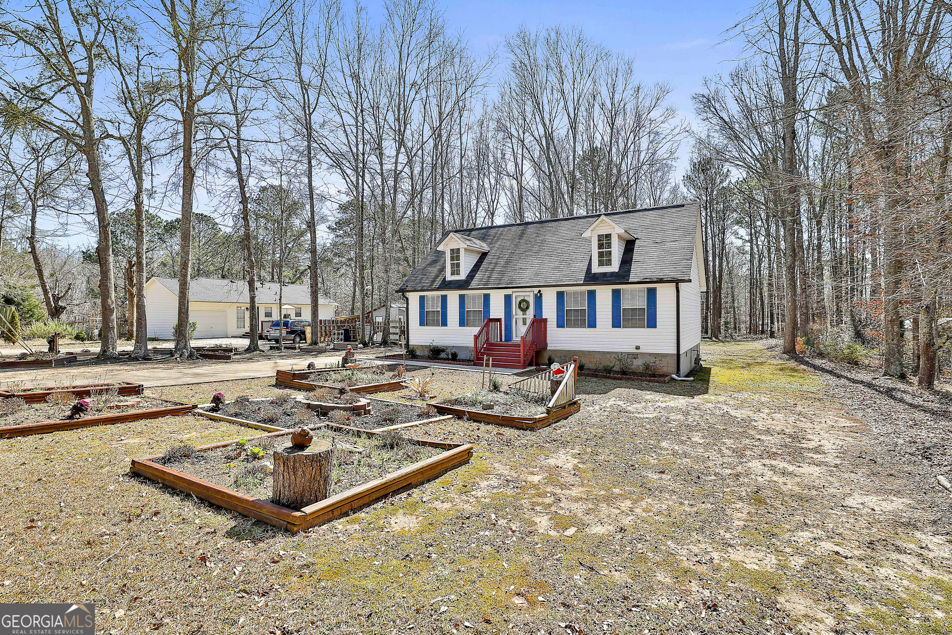 1209 North Hampton Drive Hampton, GA 30228 - Photo 2 of 39 a view of a house with a yard patio and slide