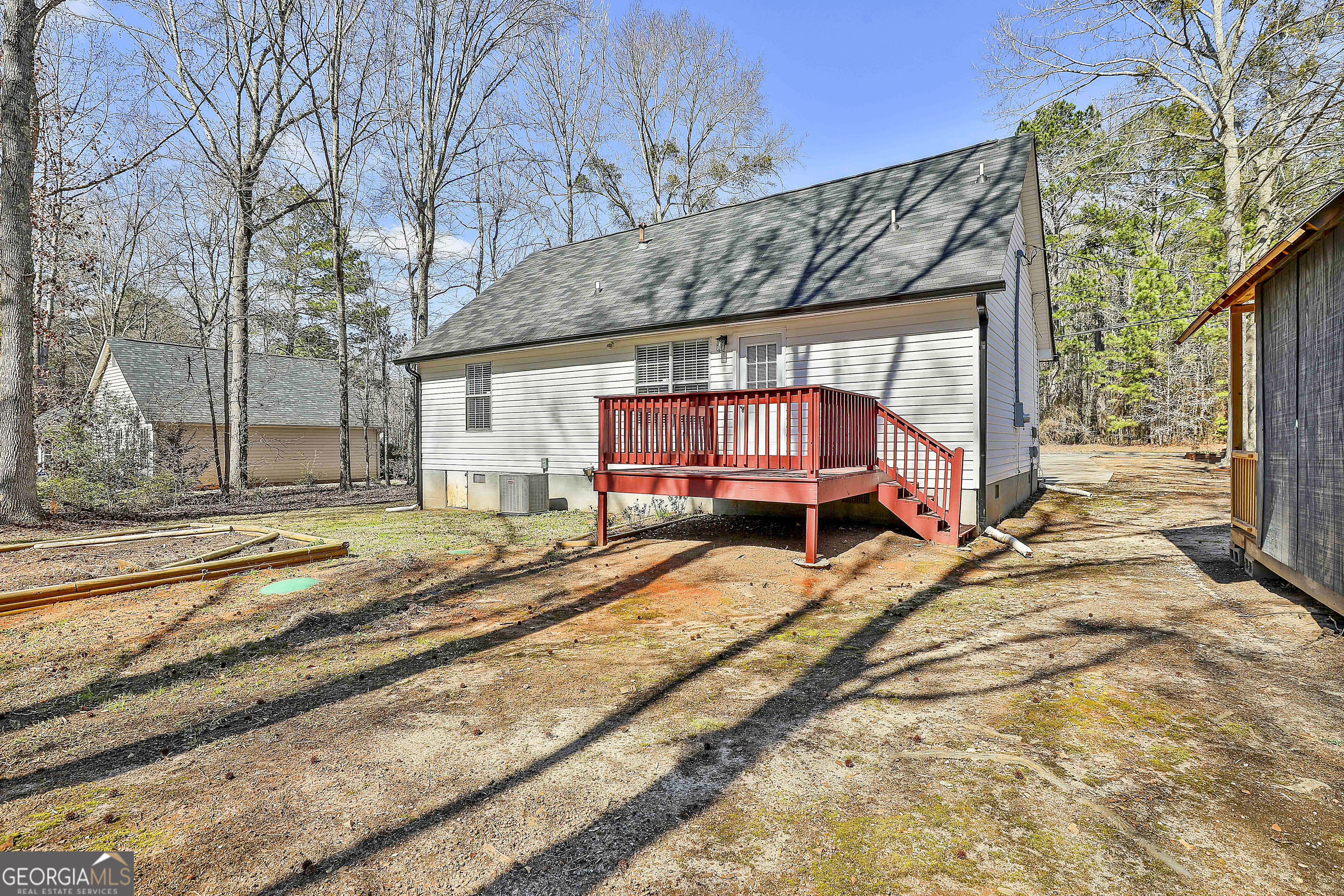 1209 North Hampton Drive Hampton, GA 30228 - Photo 32 of 39 a view of a house with a snow on the road