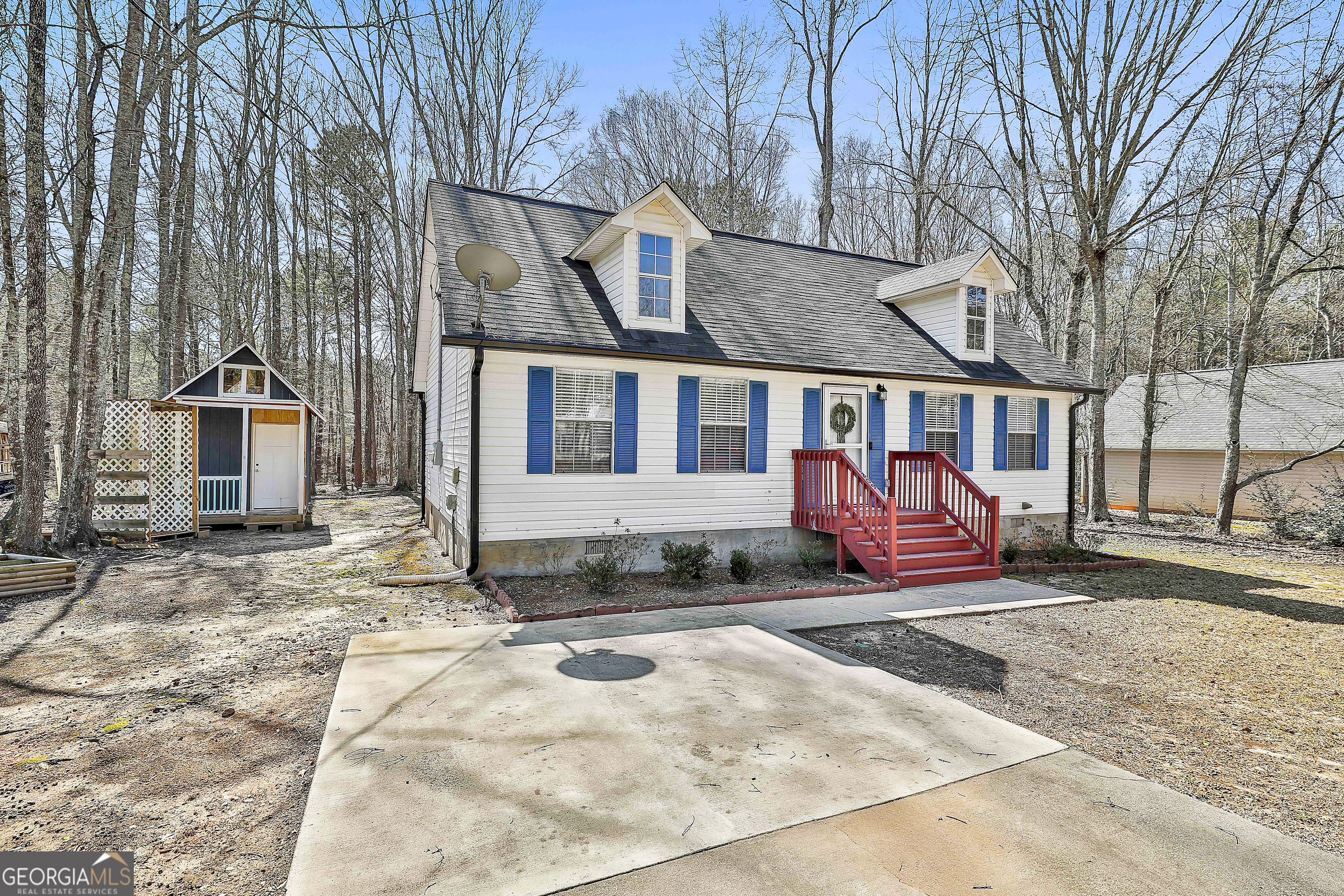 1209 North Hampton Drive Hampton, GA 30228 - Photo 4 of 39 a view of a house with wooden floor in front of house