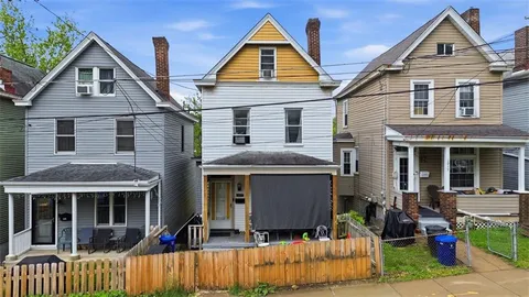 a front view of a house with a porch