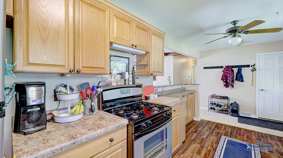 319 Croyden Street Spring Grove, IL 60081 - Photo 12 of 42 a kitchen with stove and cabinets