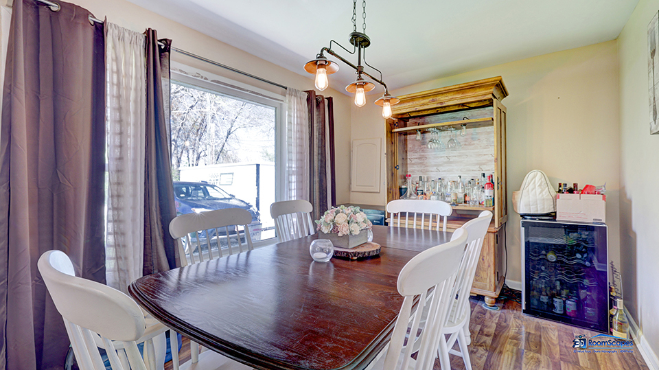 319 Croyden Street Spring Grove, IL 60081 - Photo 14 of 42 a dining room with furniture a chandelier and wooden floor