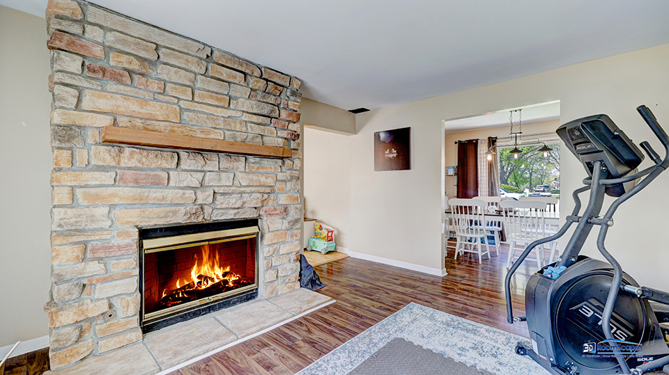 319 Croyden Street Spring Grove, IL 60081 - Photo 17 of 42 a living room with furniture and a fireplace