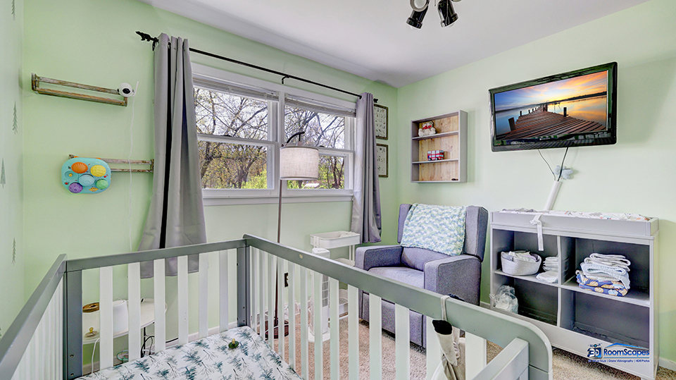 319 Croyden Street Spring Grove, IL 60081 - Photo 23 of 42 a living room with furniture and a flat screen tv