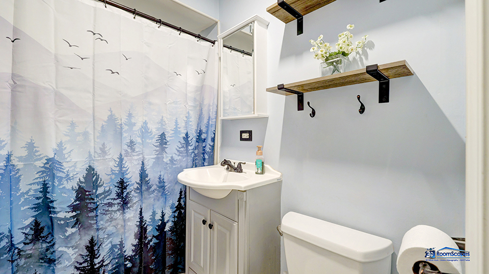 319 Croyden Street Spring Grove, IL 60081 - Photo 24 of 42 a bathroom with a sink toilet and mirror