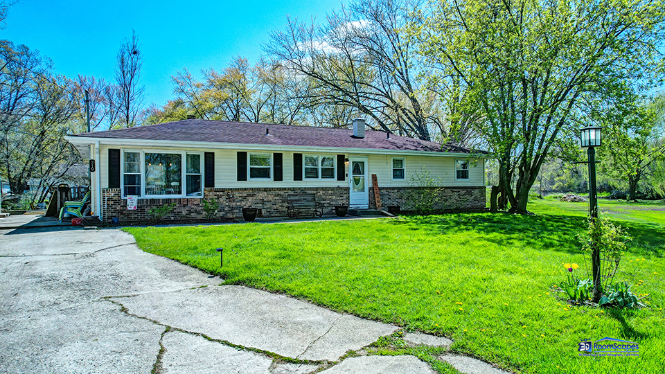 319 Croyden Street Spring Grove, IL 60081 - Photo 26 of 42 a front view of a house with a garden