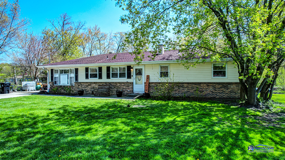 319 Croyden Street Spring Grove, IL 60081 - Photo 27 of 42 a view of a house with a yard and sitting area