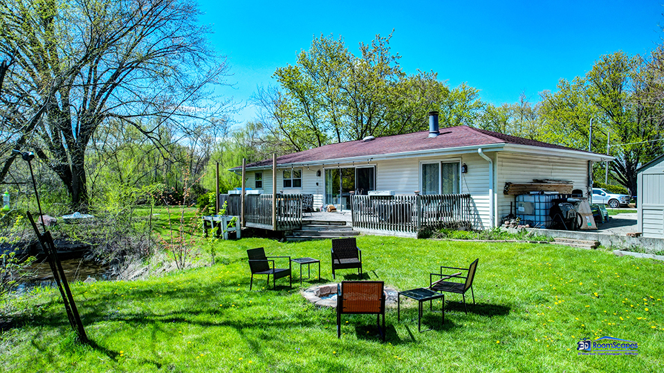 319 Croyden Street Spring Grove, IL 60081 - Photo 30 of 42 a view of a house with a yard patio and swimming pool