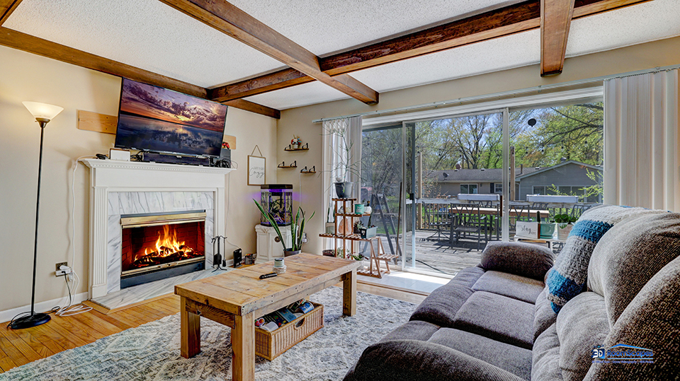 319 Croyden Street Spring Grove, IL 60081 - Photo 3 of 42 a living room with furniture a flat screen tv and a fireplace