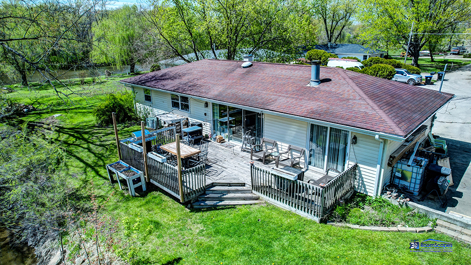 319 Croyden Street Spring Grove, IL 60081 - Photo 32 of 42 a view of a house with patio and a yard