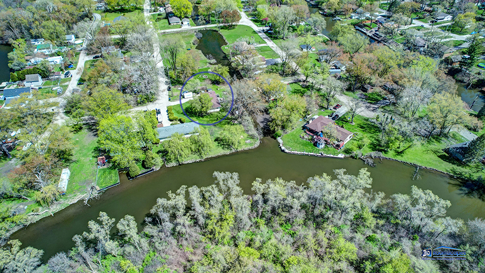 319 Croyden Street Spring Grove, IL 60081 - Photo 38 of 42 a view of a garden with a lot of trees
