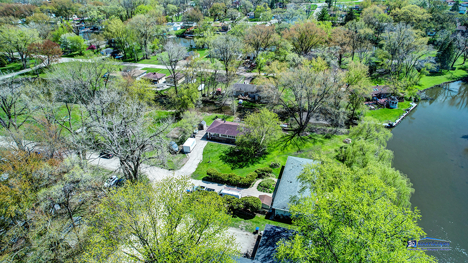319 Croyden Street Spring Grove, IL 60081 - Photo 40 of 42 an aerial view of residential house with outdoor space and trees all around