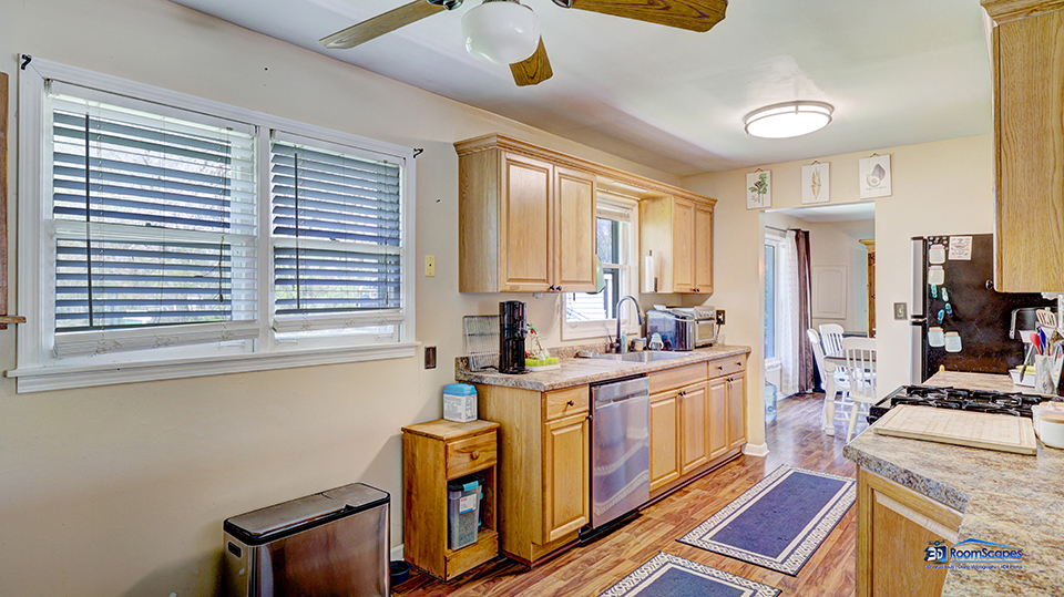 319 Croyden Street Spring Grove, IL 60081 - Photo 8 of 42 a kitchen with stainless steel appliances granite countertop a stove a sink and a refrigerator