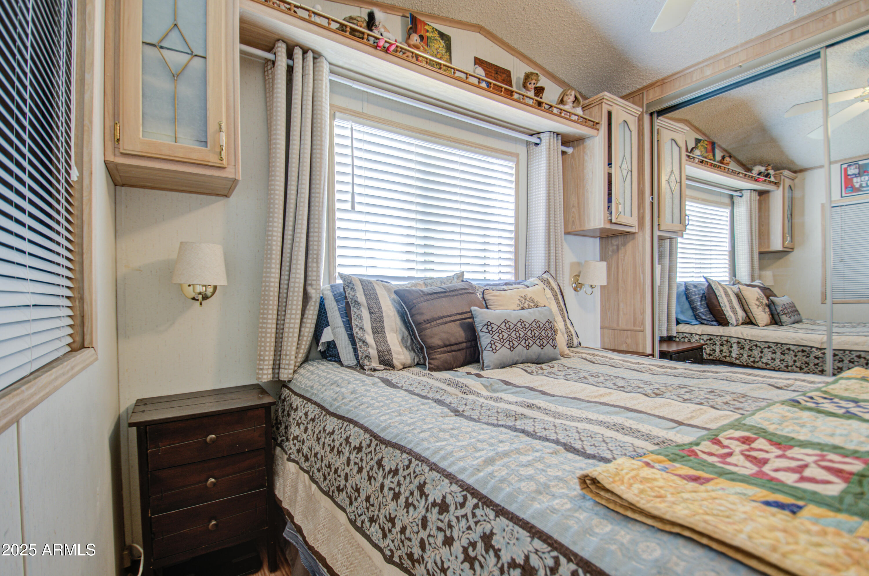 7750 East Broadway Road, Unit 475 Mesa, AZ 85208 - Photo 12 of 34 a bedroom with a bed and a window