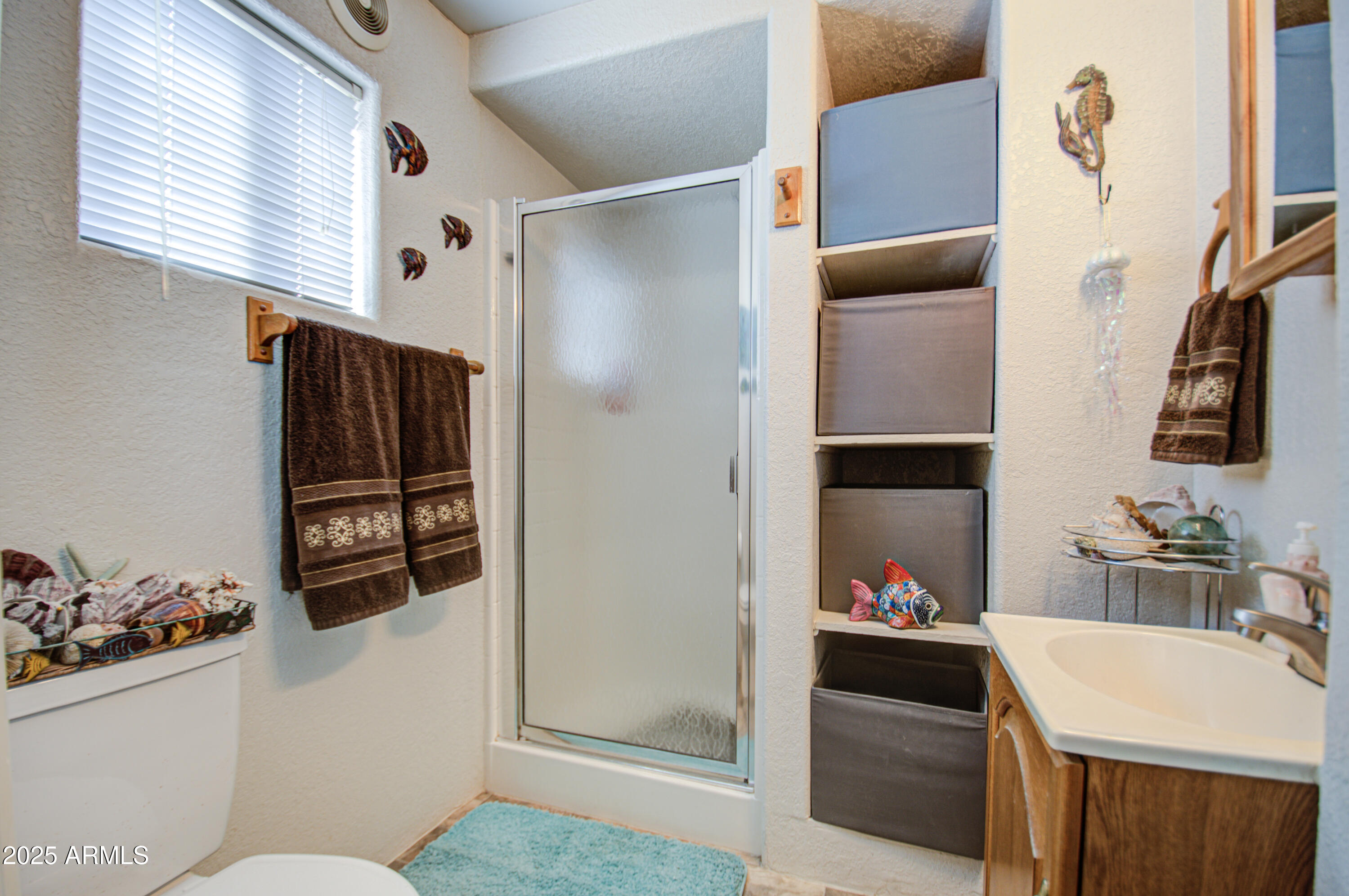 7750 East Broadway Road, Unit 475 Mesa, AZ 85208 - Photo 18 of 34 a kitchen with stainless steel appliances granite countertop a refrigerator and a sink