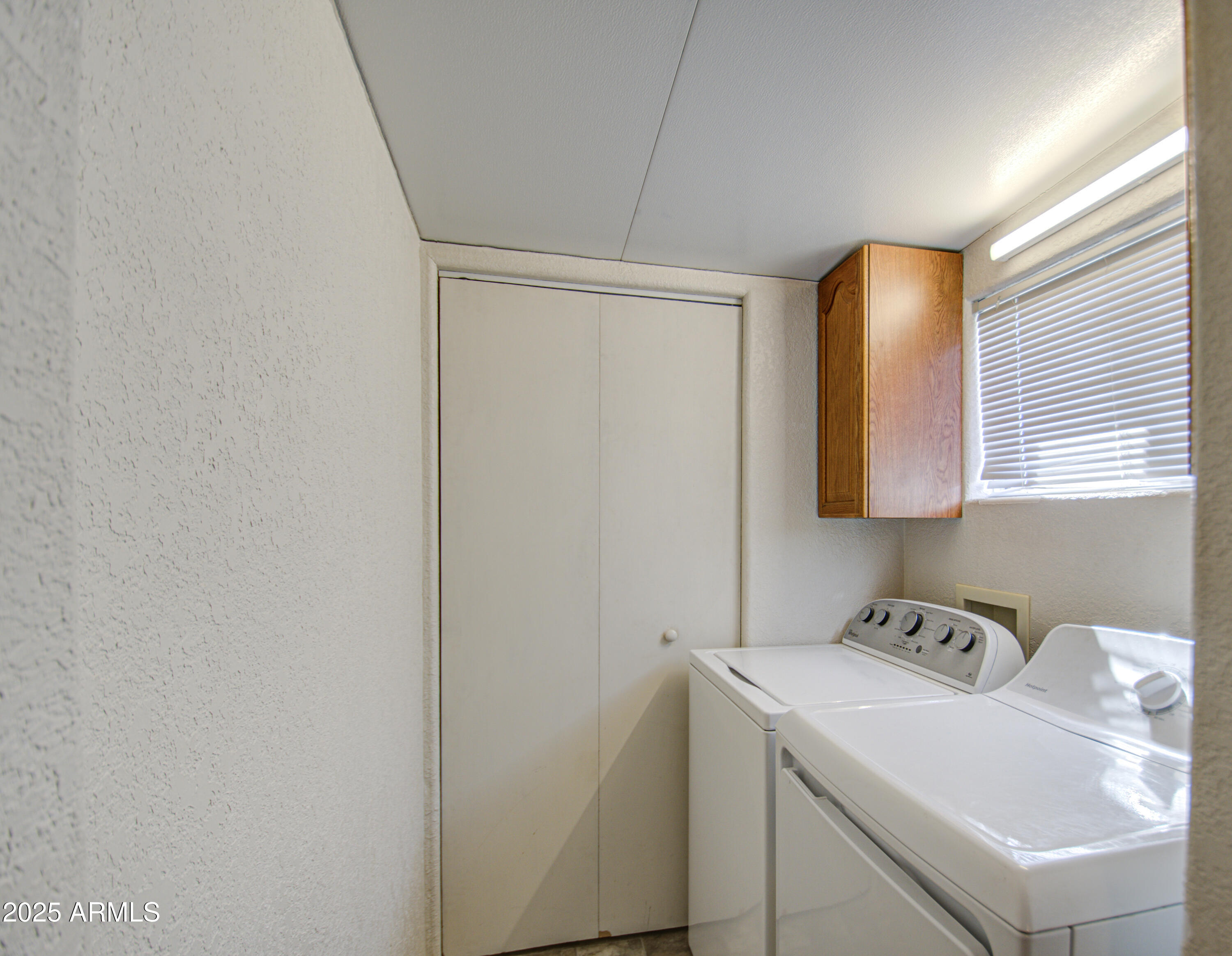 7750 East Broadway Road, Unit 475 Mesa, AZ 85208 - Photo 20 of 34 a utility room with a sink dryer and washer