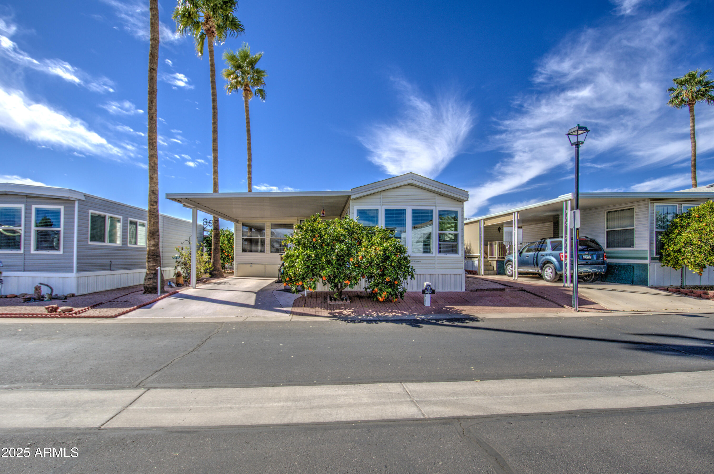 7750 East Broadway Road, Unit 475 Mesa, AZ 85208 - Photo 24 of 34 a front view of a building with street view