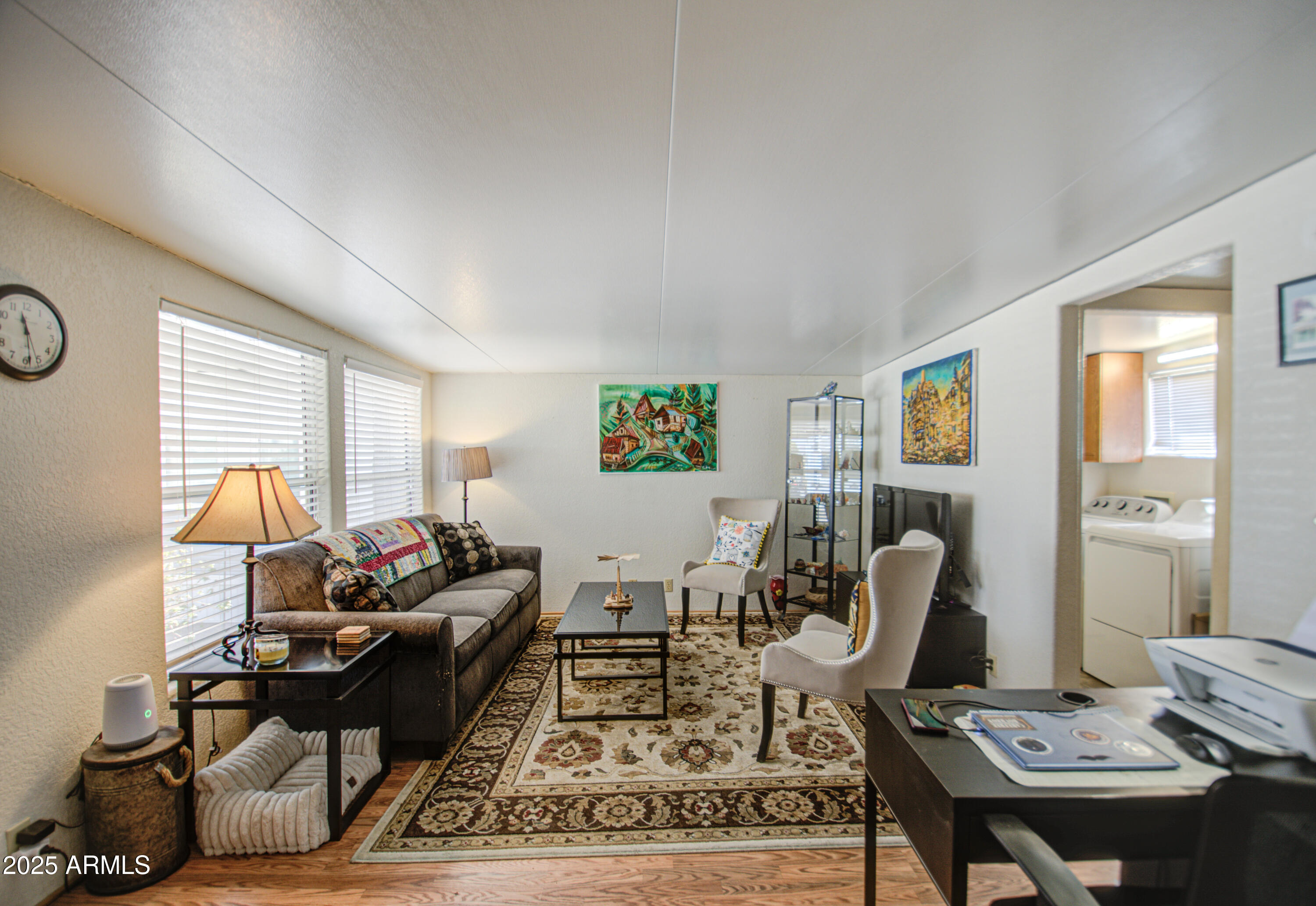 7750 East Broadway Road, Unit 475 Mesa, AZ 85208 - Photo 5 of 34 a living room with furniture a rug and a window