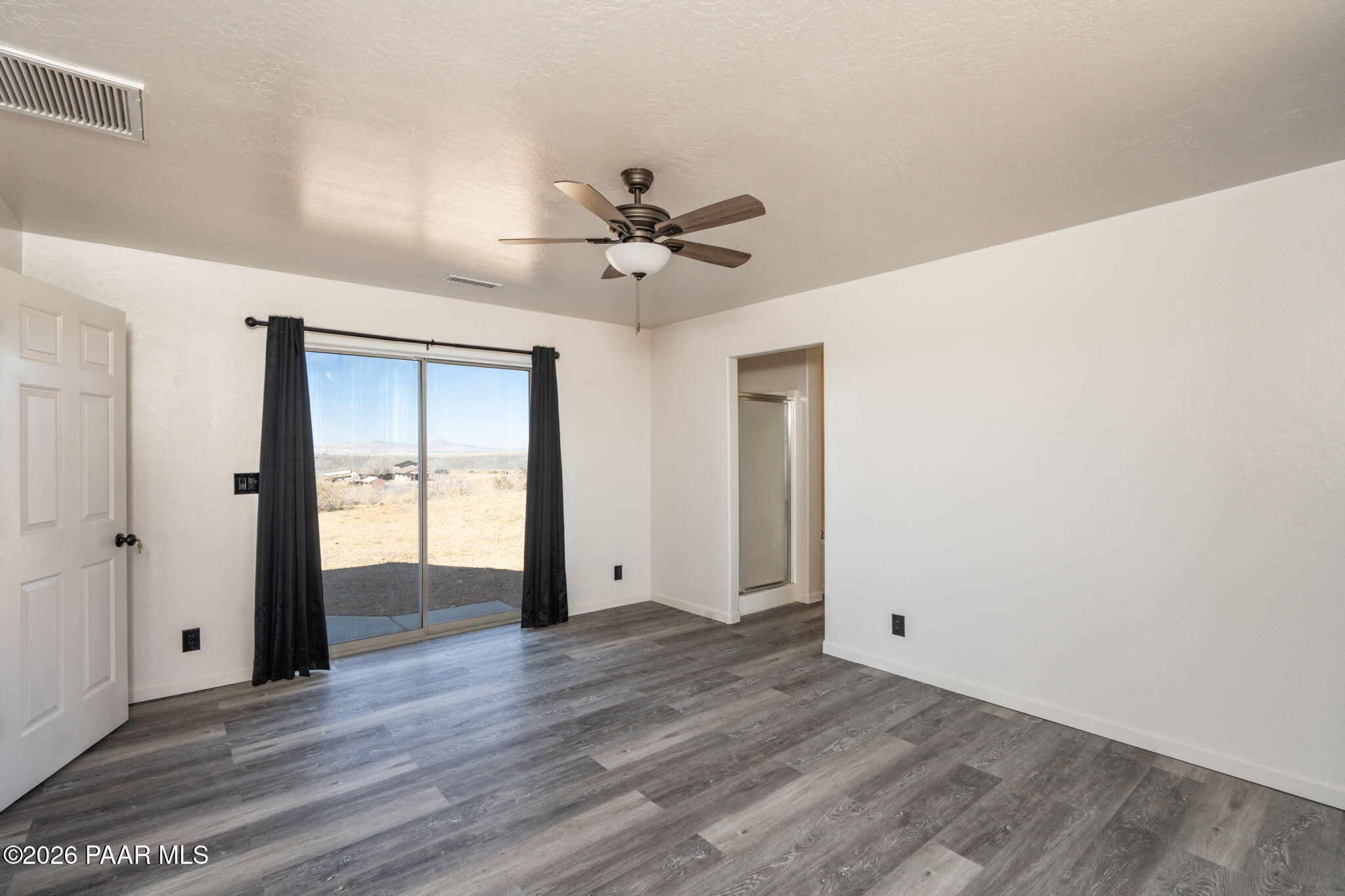 16751 Leprechaun Road Dewey, AZ 86327 - Photo 18 of 46 wooden floor in an empty room
