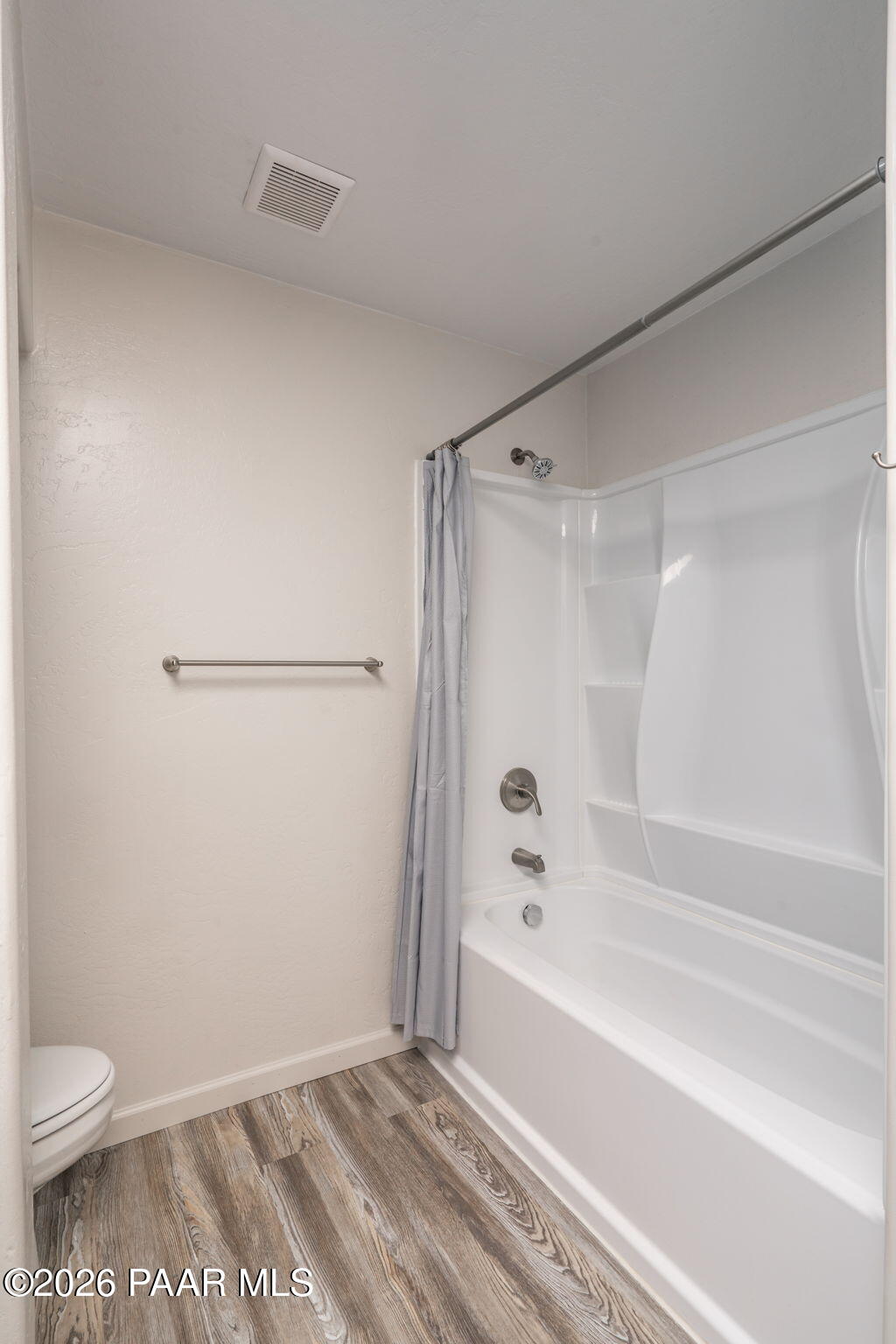 16751 Leprechaun Road Dewey, AZ 86327 - Photo 29 of 46 a bathroom with a shower and a toilet