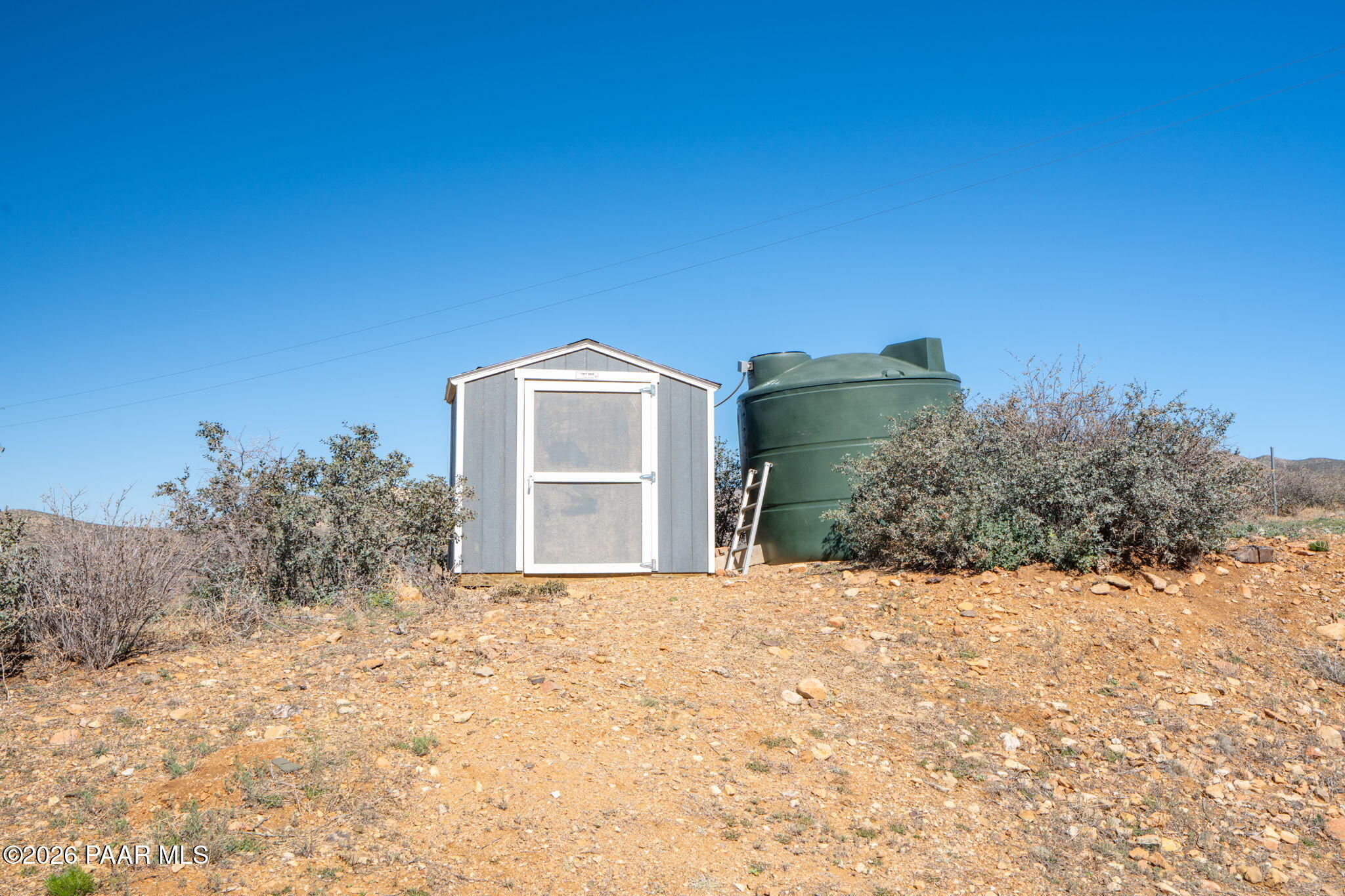 16751 Leprechaun Road Dewey, AZ 86327 - Photo 38 of 46 a view of a house with a yard
