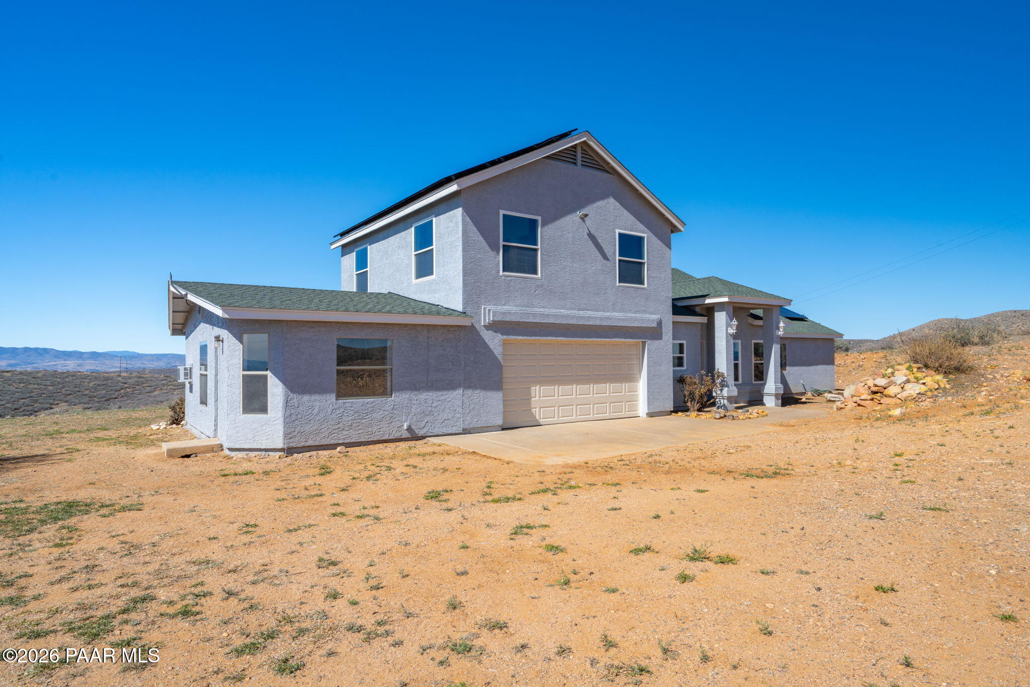 16751 Leprechaun Road Dewey, AZ 86327 - Photo 6 of 46 a front view of a house with a yard