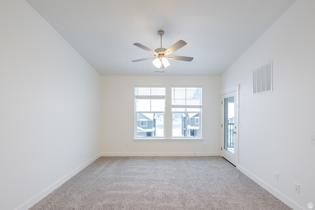 709 West 4500th South, Unit N301 Mapleton, UT 84664 - Photo 14 of 17 Unfurnished room with light colored carpet and ceiling fan