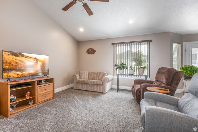 1228 North Providence Way Tooele, UT 84074 - Photo 5 of 28 Living space featuring vaulted ceilings, recessed lighting, ceiling fan, and carpet flooring