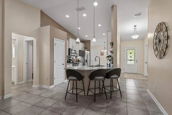 a view of a dining room with furniture