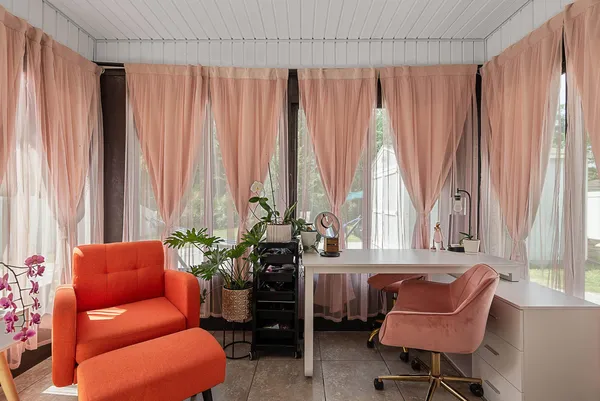 a outdoor living space with furniture and a potted plant