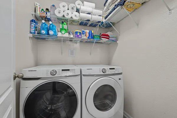 an aerial view of a house with swimming pool