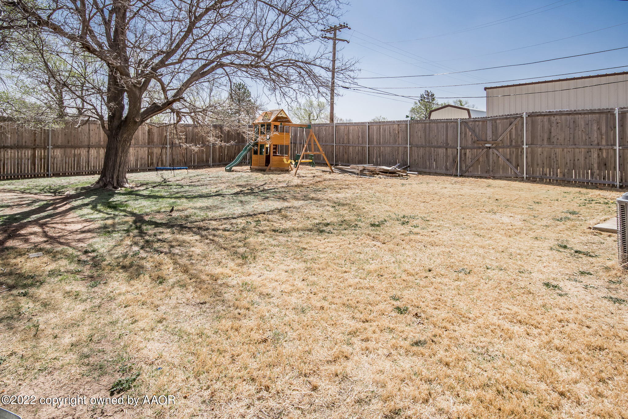 4801 Gary Lane Amarillo, TX 79110 - Photo 20 of 21 a view of wooden fence and snow