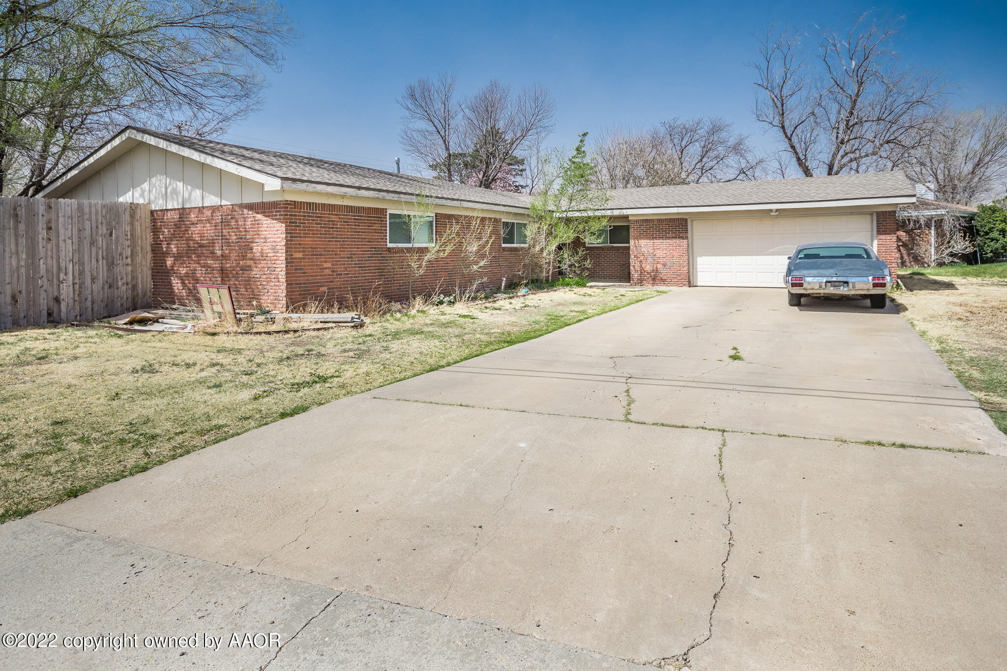 4801 Gary Lane Amarillo, TX 79110 - Photo 2 of 21 a view of a car parked on the side of the house