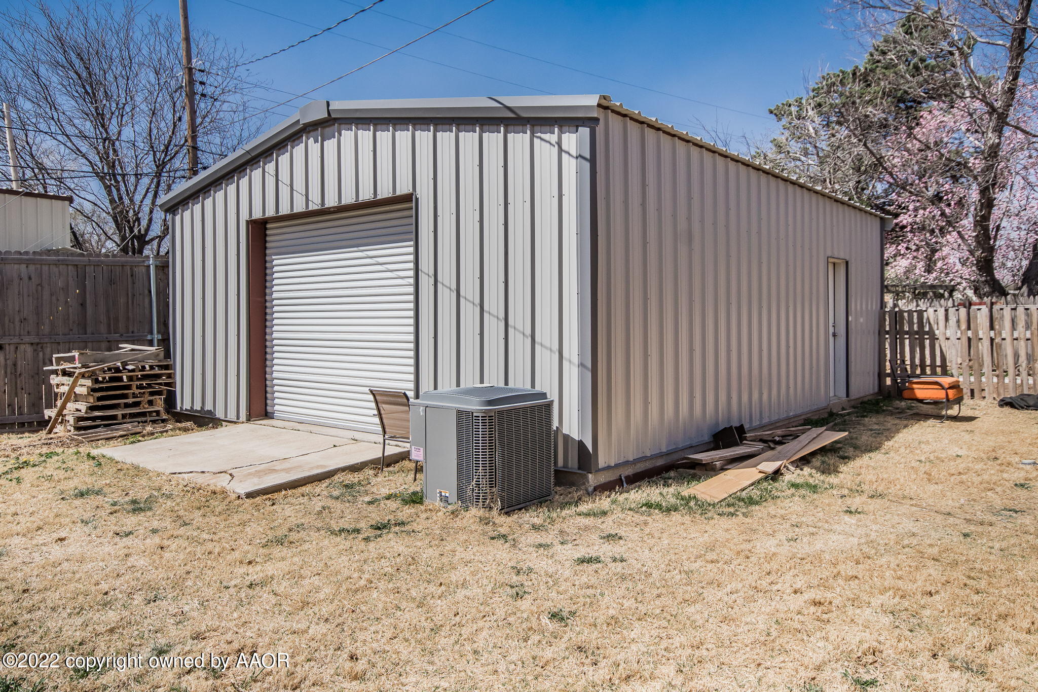 4801 Gary Lane Amarillo, TX 79110 - Photo 21 of 21 a view of wooden house and a yard