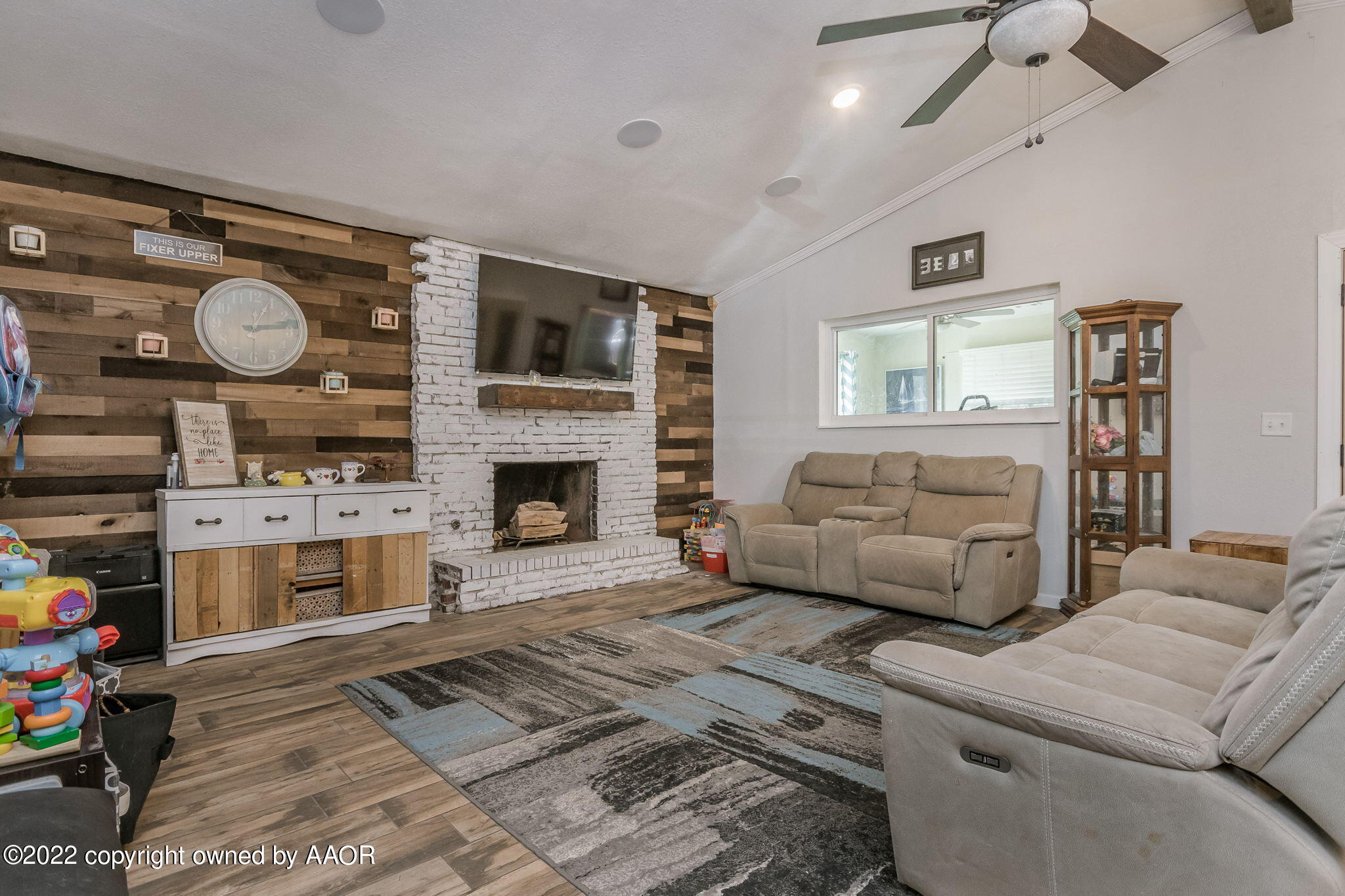 4801 Gary Lane Amarillo, TX 79110 - Photo 3 of 21 a living room with furniture and a fireplace