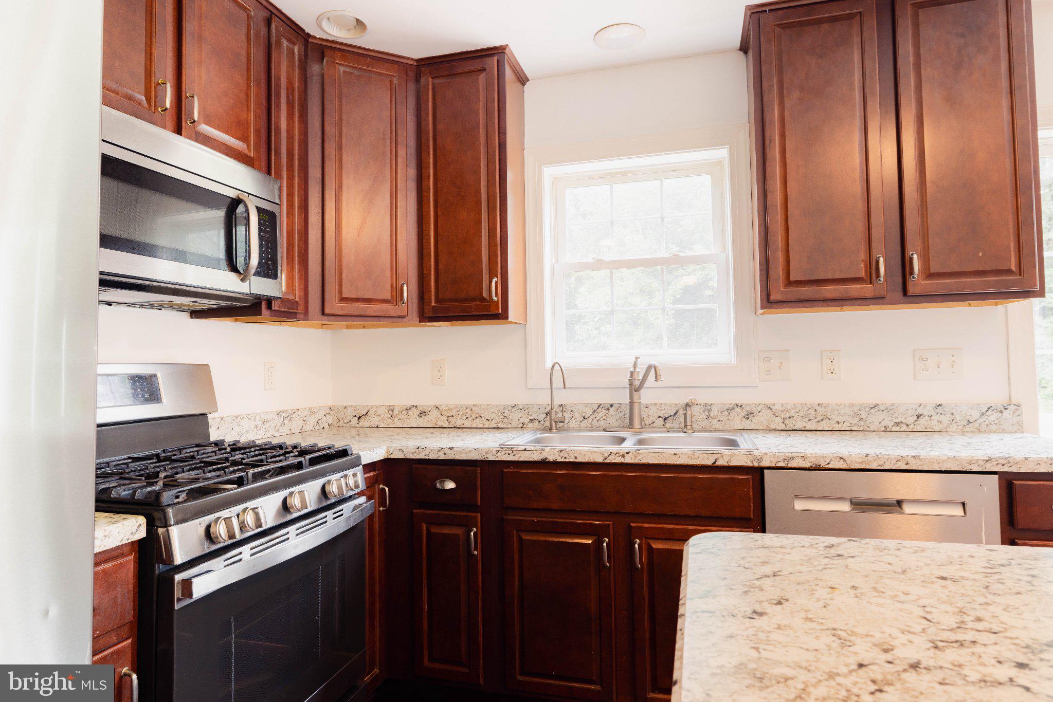 25 Killinger Road Etters, PA 17319 - Photo 7 of 25 Modern kitchen with rich wood accents.