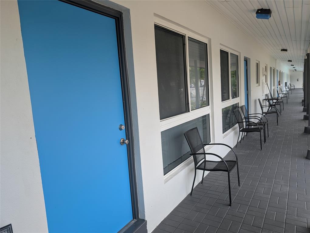 3217 Northeast 9th Street, Unit 5 Pompano Beach, FL 33062 - Photo 11 of 12 a view of entryway with furniture
