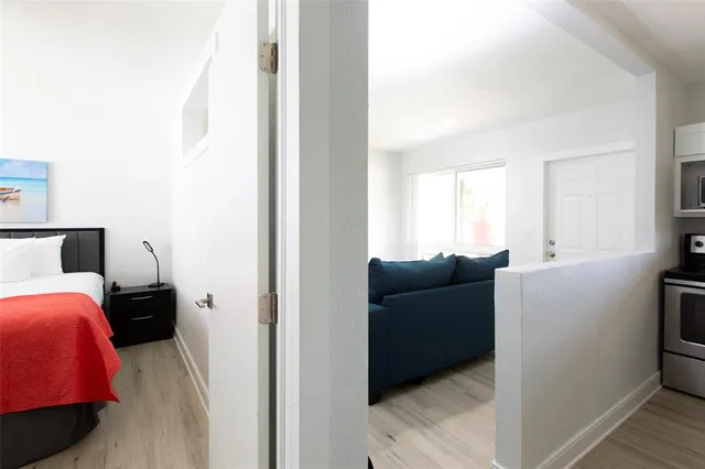 a living room with furniture and a window