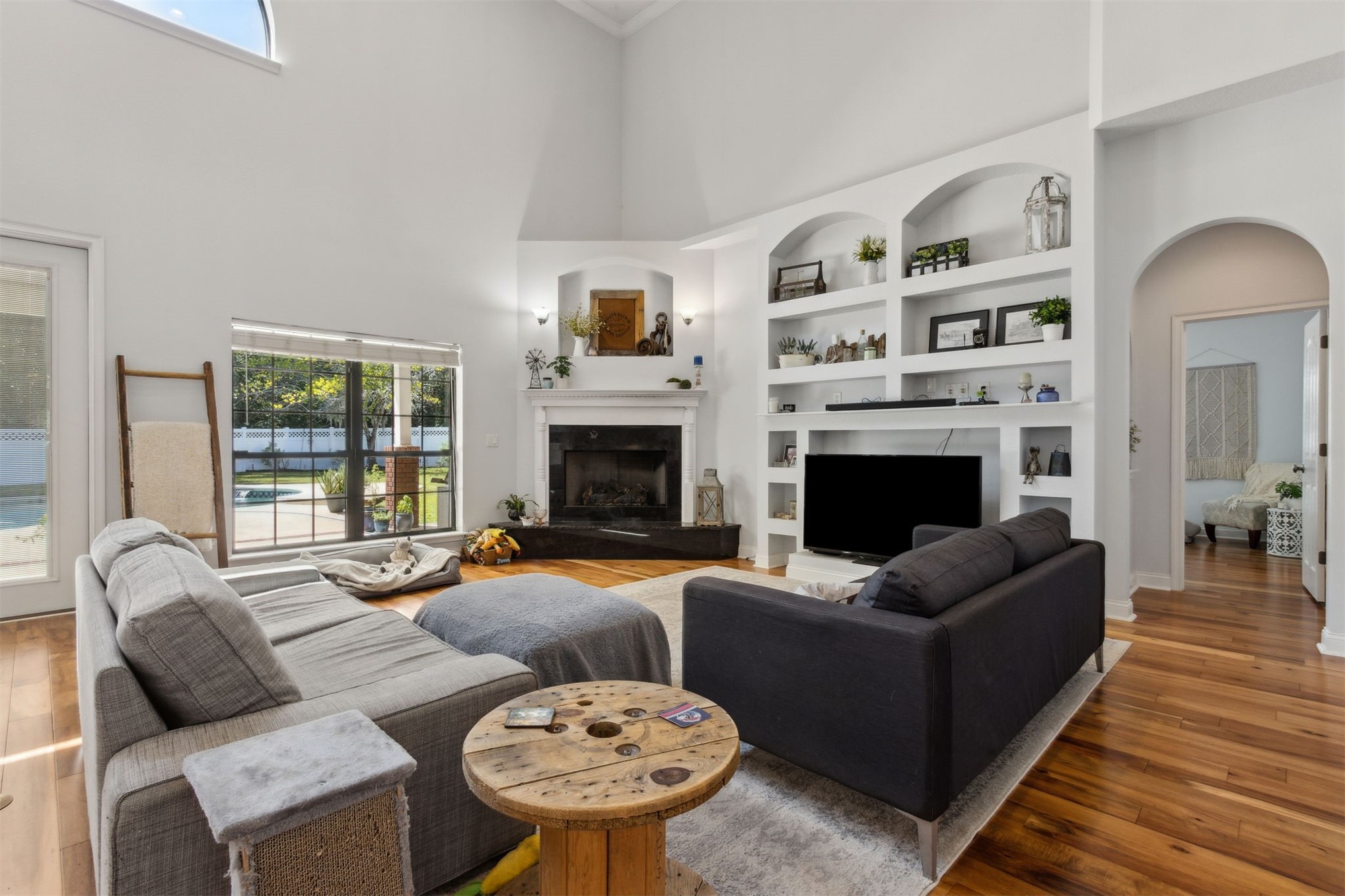 87377 Raddin Road Yulee, FL 32097 - Photo 20 of 75 a living room with furniture fireplace and window