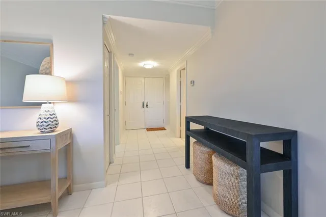 a kitchen with a sink cabinets and a stove top oven