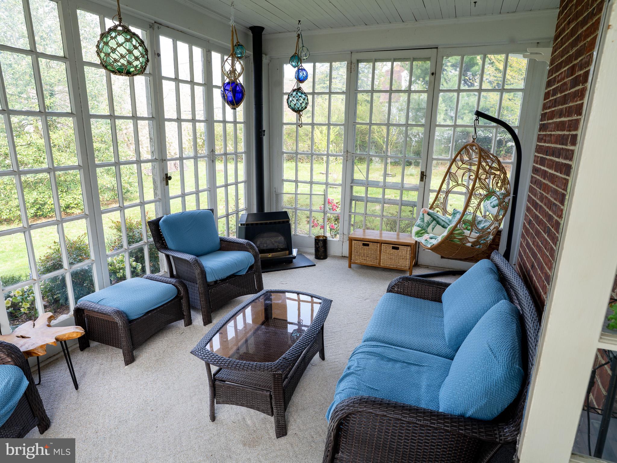 443 High Street Mount Holly, NJ 08060 - Photo 22 of 42 Serene sunlit porch retreat.